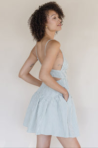 Ocean Lines Cut Out Pleated Mini Dress