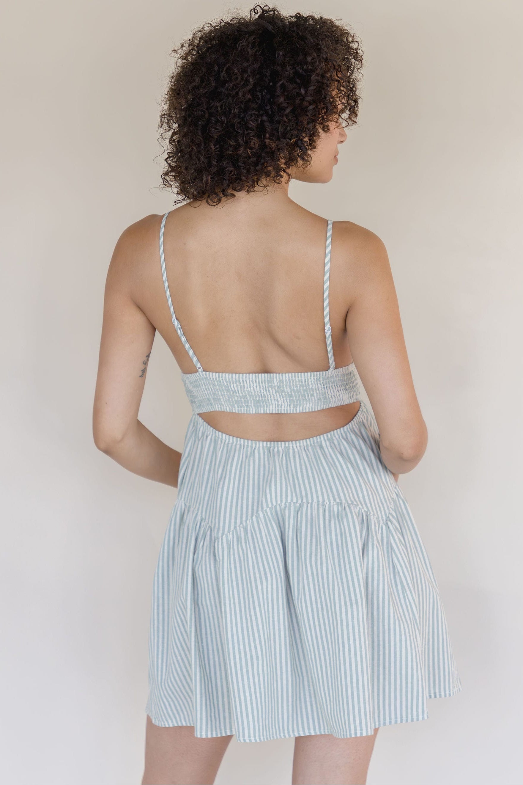 Ocean Lines Cut Out Pleated Mini Dress